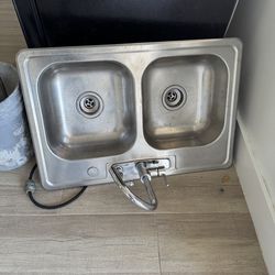 Sink with faucet