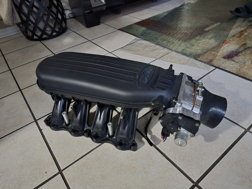 67 mill throttle body
& Cobra jet mainfold intake