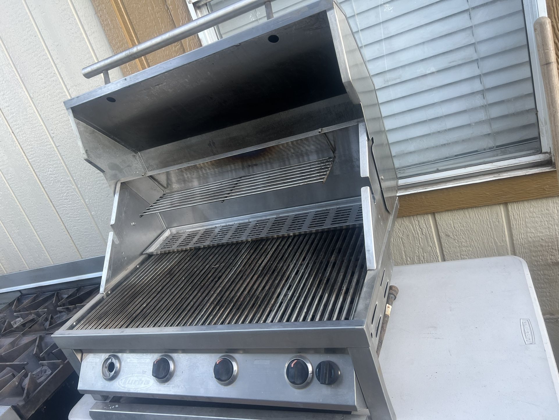 Turbo. Natural Gas This grill has barely been used, maybe once or twice just dirty from being outside sitting over a year