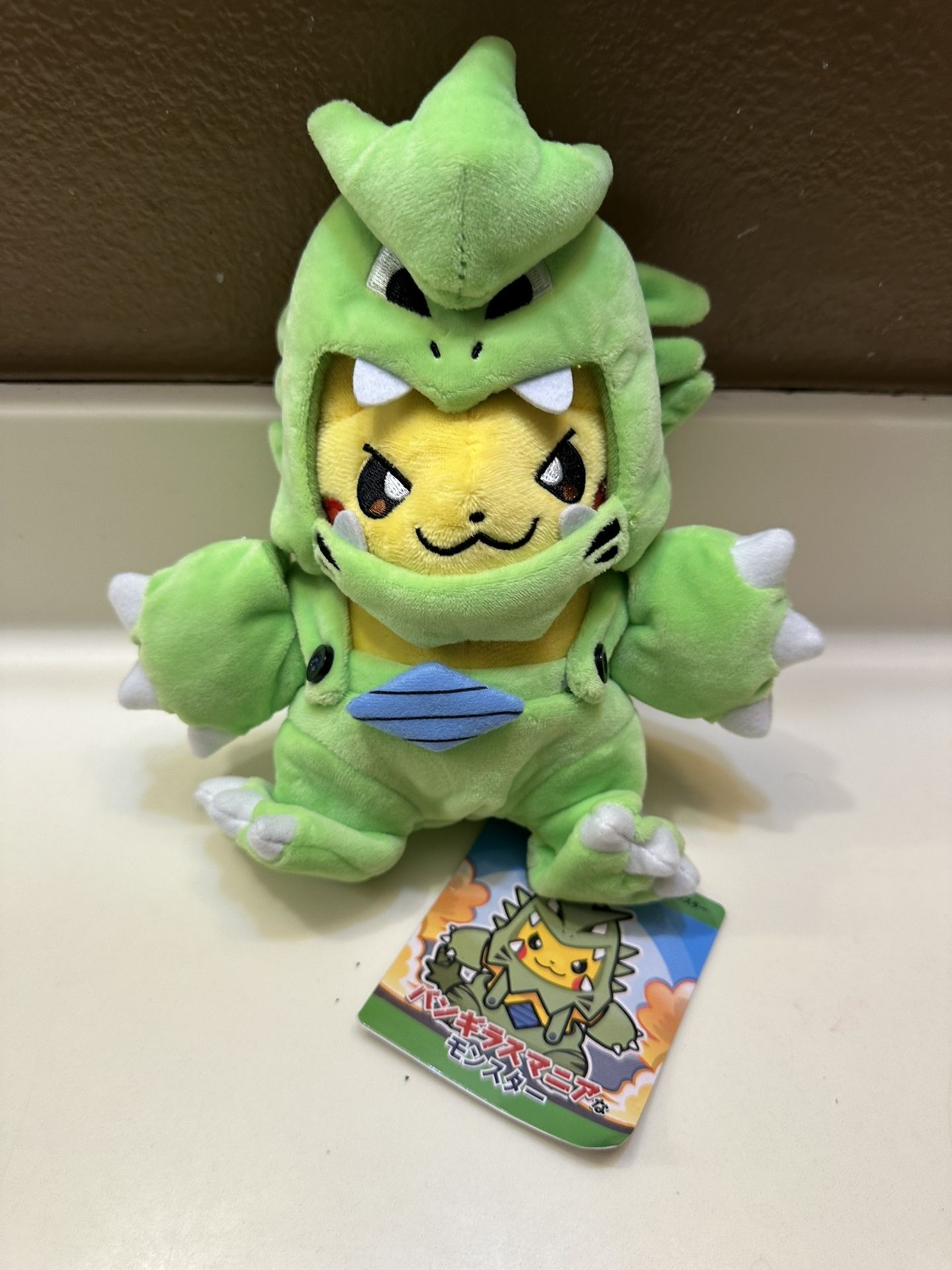 New Pikachu In A Tyranitar Poncho Pokemon Plush