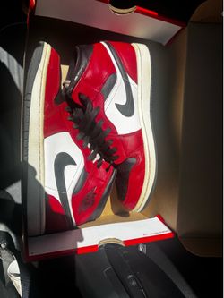 Size 8.5 Air Jordan 1 mid Chicago plus another pair