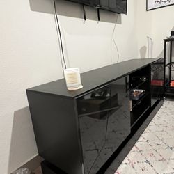 Black Entertainment Center with LED lights.