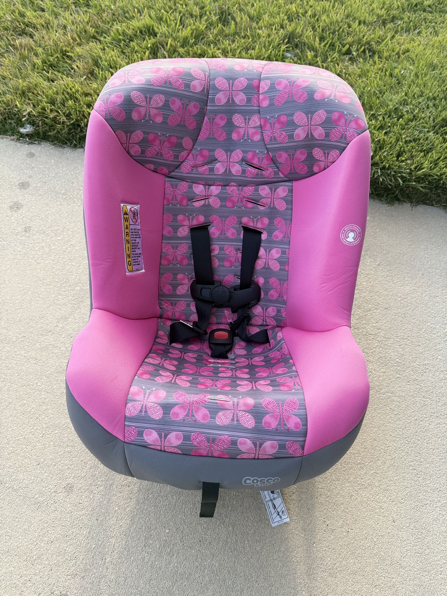Selling a pink Cosco car seat.