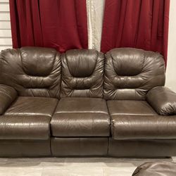 Two (2) Brown leather sofas