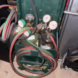Torch Set Oxygen Acetylene With Hoses, Regulators And Tanks Two Sets Available Extra Gauges One Per Set. 