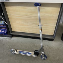 Razor A2 Kick Scooter – Blue, Wheelie Bar, Foldable, Lightweight, for Child Ages 5+