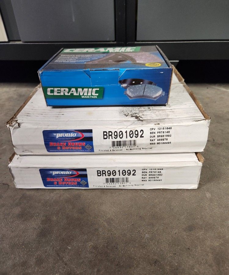 Ceramic brake pads and 2 front rotors Brand NEW SEALED