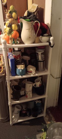 VINTAGE SHELF WITH MERCHANDISE.