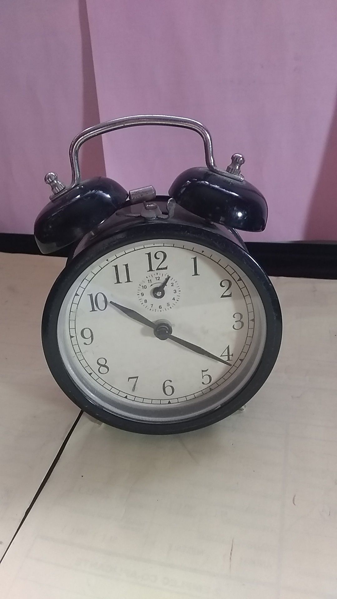 Antique alarm clock hand Wind up