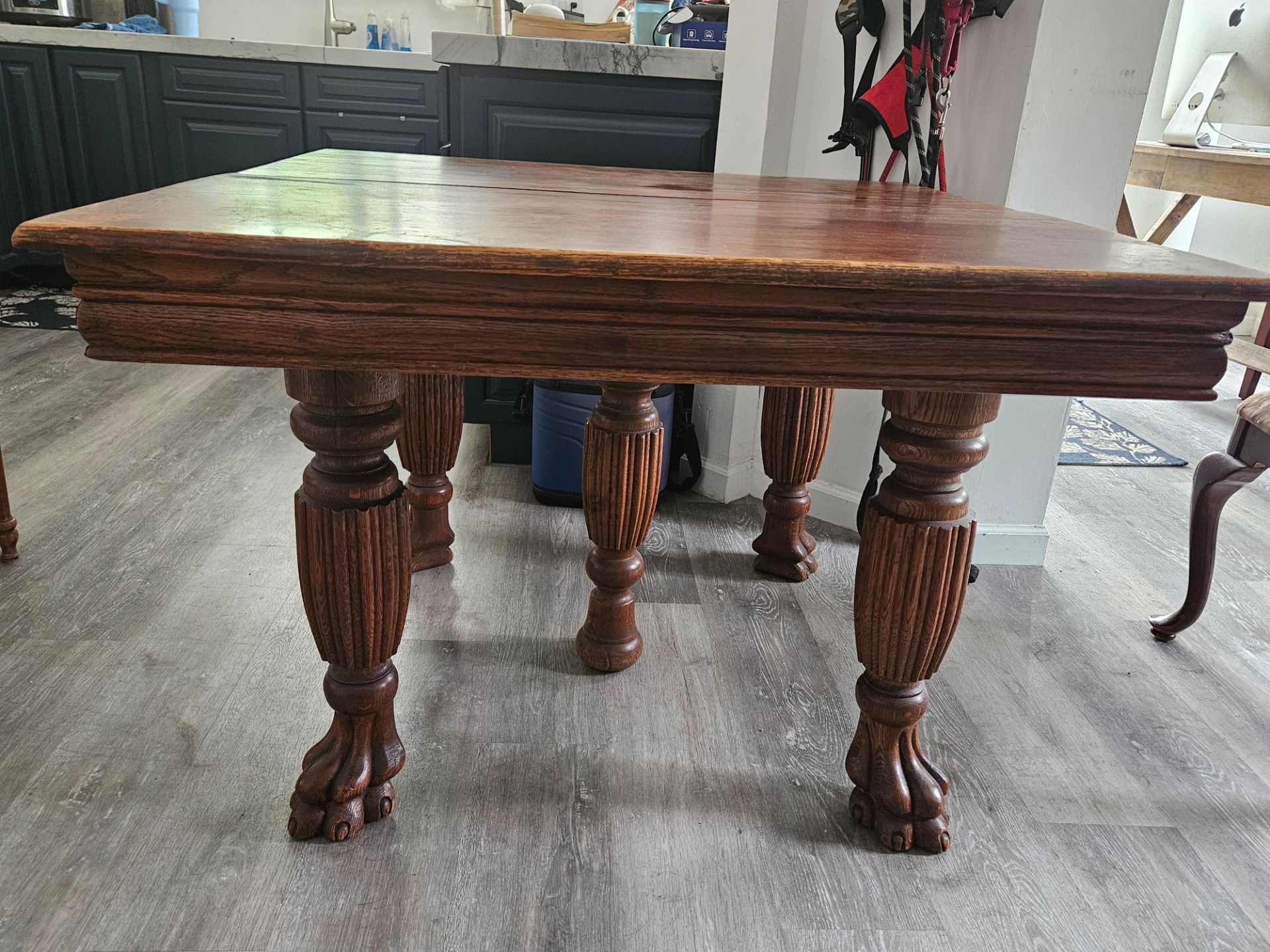 Early 20th Century solid oak clawfoot dining table
