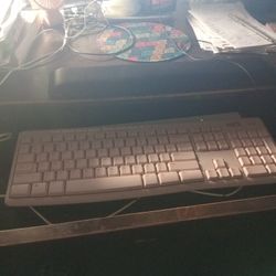 Pink Keyboard With Mouse.