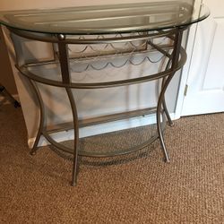 Sofa table/wine rack with glass top