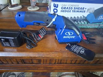 Sun Joe 2 in 1 cordless grass sheer plus hedge trimmer. 7.2 volt lithium ion technology.