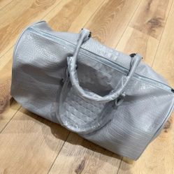 Privata Duffle Bags