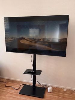 Moving Sale: 65" LG 4K Smart TV + Floor Stand