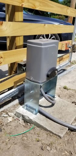 Electric gate shaking, dragging, or jamming? I fix chain, rollers, and tracks