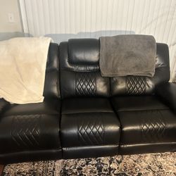 Two Leather Reclining Couches