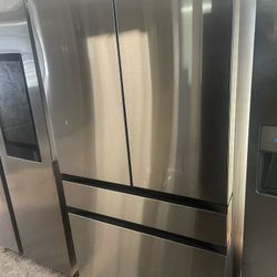 Delivery available nice four-door refrigerator working