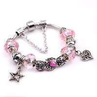 Pink heads bracelet with charms new