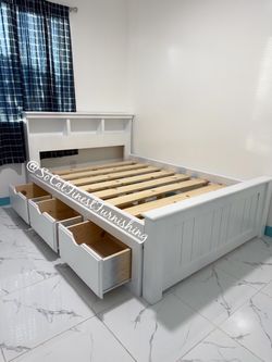White full bed with drawers