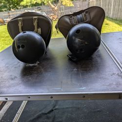 Two Bowling Balls With Cases
