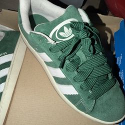 Two Pair Of Adidas  Size 9.5