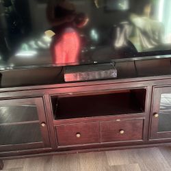 72 In X 22 In  TV Table . Used. Pictures Show Scratches 