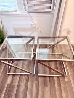 Beautiful Brush Nickle Glass Living Room Side Tables from Ashleys Furniture