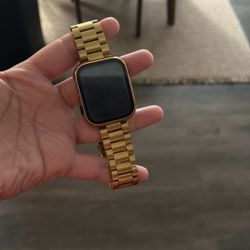 Apple Watch with gold band