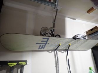 Snowboard with binding