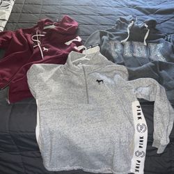 Pink sweaters size medium