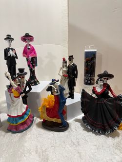 Dancing couples Catrine’s & Catrina’s each set $20 candles $3.00 each