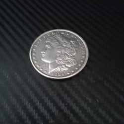 1884 MORGAN SILVER DOLLAR