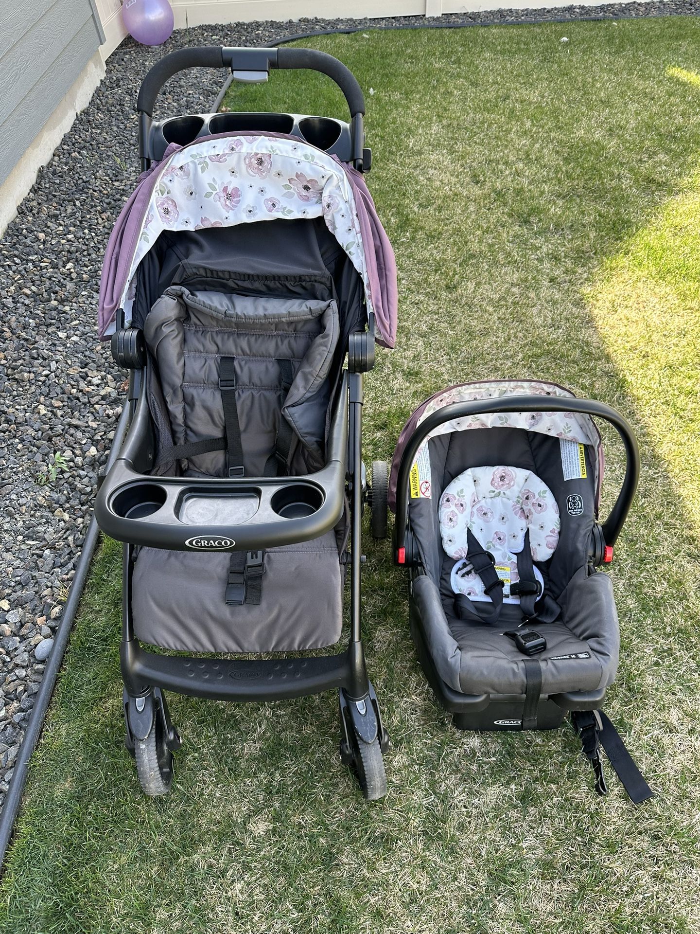 Graco stroller and carseat. Snug ride 30, Verb click connect travel system. Black and purple.