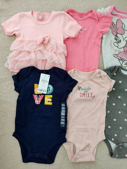 Baby girl onesies size 6 to 9 months. Fontana pickup.