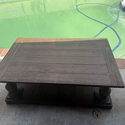 Solid wood coffee table for sale. 90% new. Very sturdy.