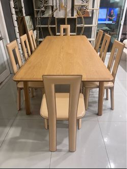 Dining Table + 8 Ycami Collection  Chairs – $1,000