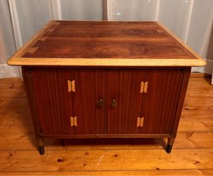 commode / storage table from the Lane Furniture Acclaim line designed by Andre Bus