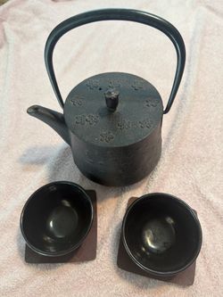 Japanese cast iron tea pot and cups