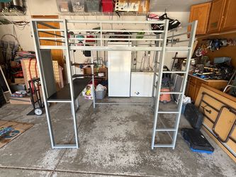 Full sized loft bed with desks & shelves