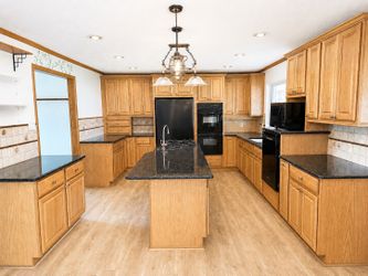 Solid Oak Kitchen Cabinet Set-priced to sell!