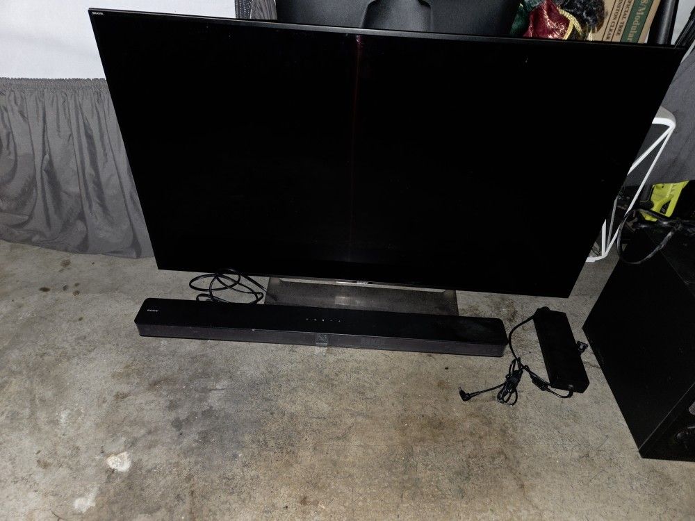 49 Inch Sony 4k HDR W/ Soundbar & Sub
