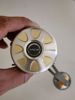 Shimano cardiff 301A left hand Baitcaster Reel with braid line on it is like new