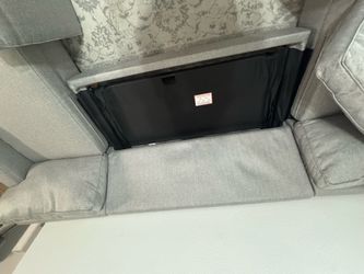 Grey sofa with 2 chaises and a full size sleeper