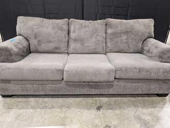 Comfortable Gray Upholstered Three-Seat Sofa