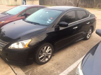 Nissan Sentra Year 2013 Miles 50300 Very good condition black color 2013 yrs..... Tile :rebuilt