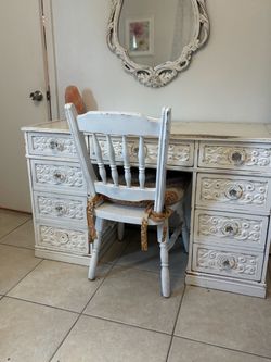 White wooden desk and chair