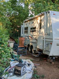 Camper with pop out