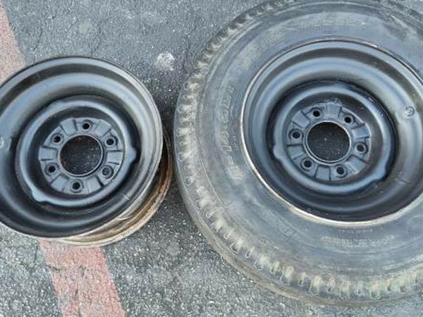 Two 14.5 inch trailer wheels. 6 on 5.5 inches