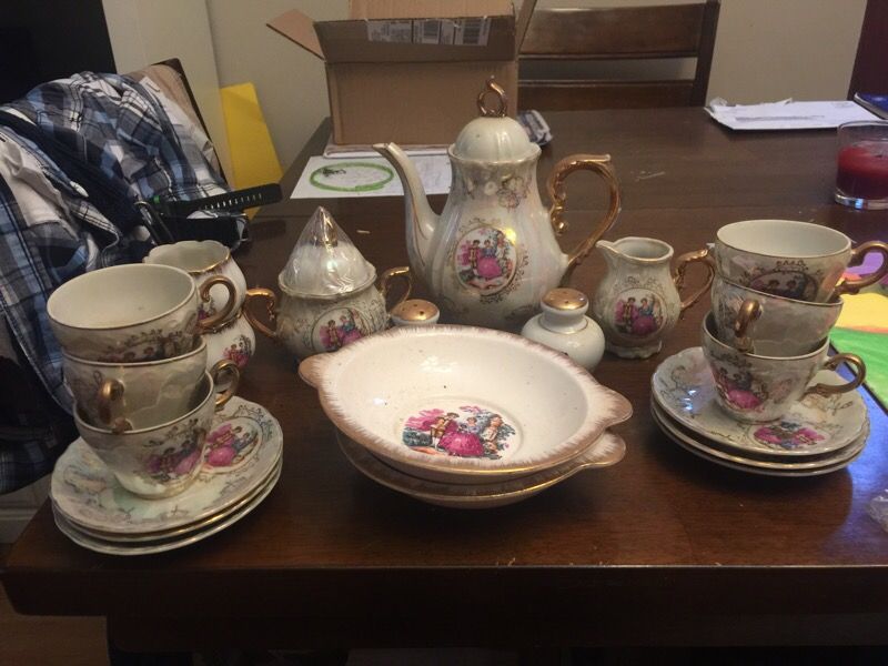 Beautiful vintage tea set with gold trim